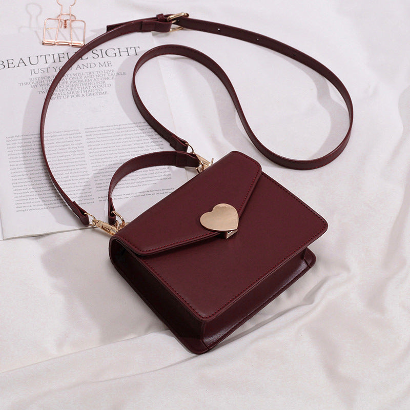 Heart Lock Crossbody Bag