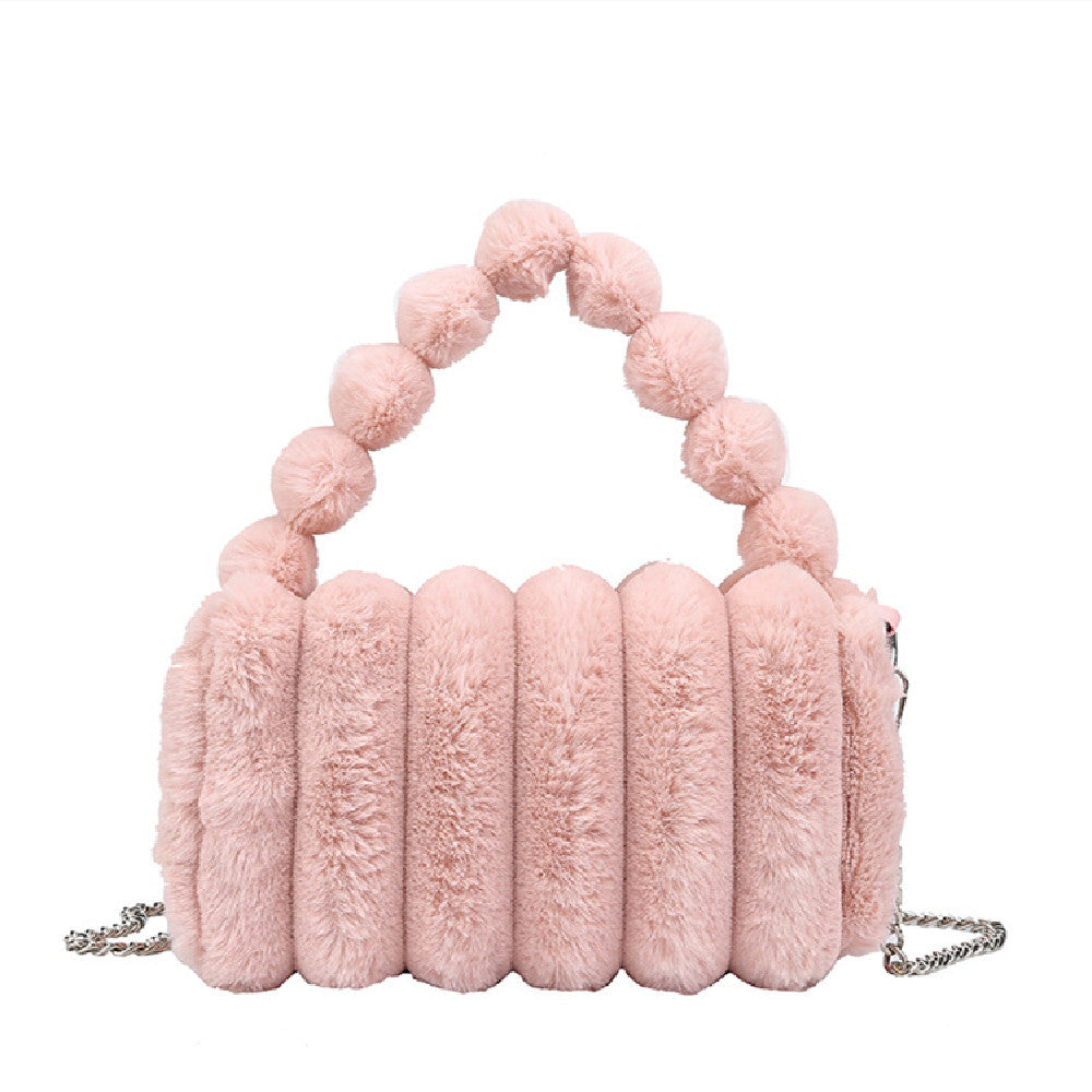 Elegante bolso de peluche con forma de calabaza