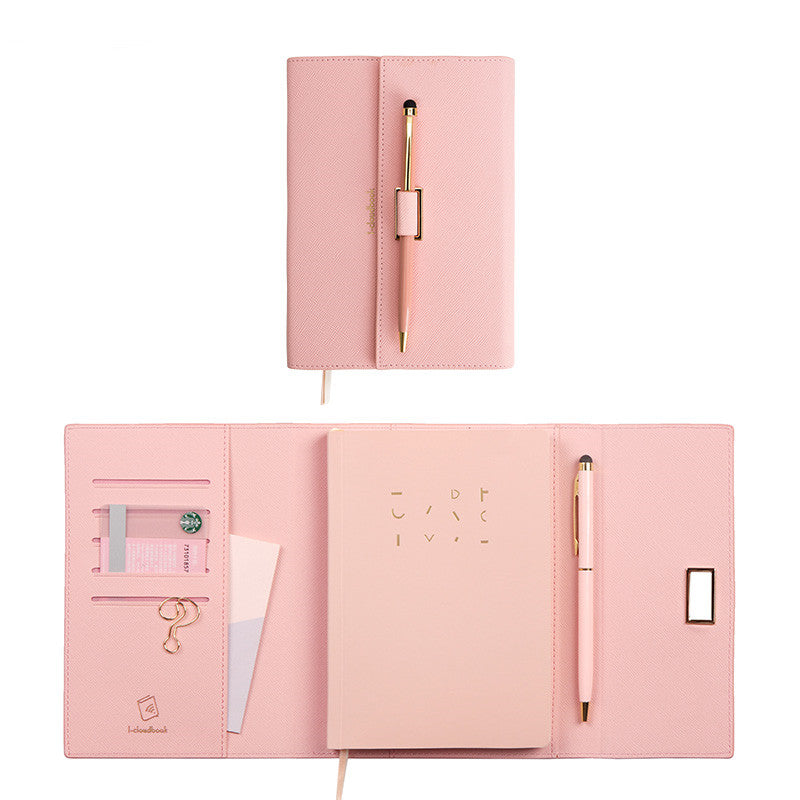 notebook with pen