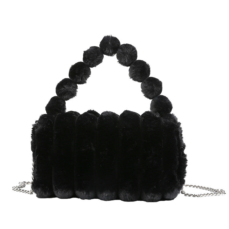 Elegante bolso de peluche con forma de calabaza